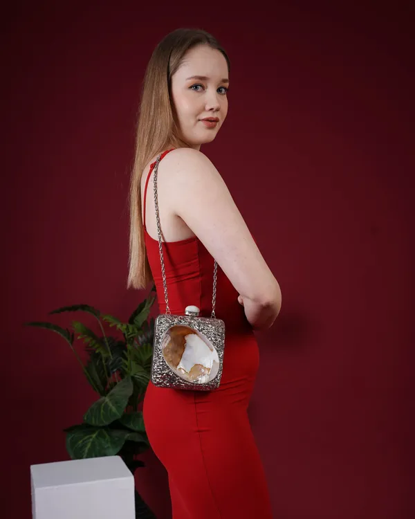 Kaia_Raw_Shell_Metal_Clutch